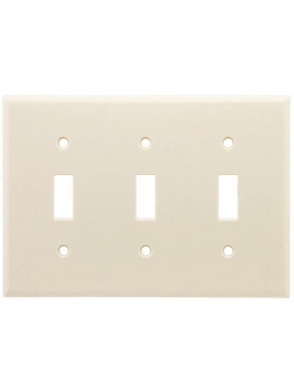 Leviton Triple Toggle Cover Plate in Light Almond.